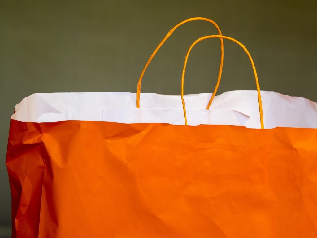 Shops in Bend - Orange paper shopping bag